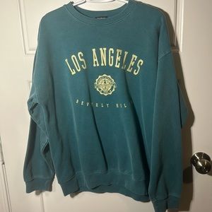 boohoo aqua colored women’s size medium los angeles sweatshirt top